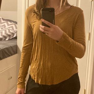 Yellow and white striped shirt.